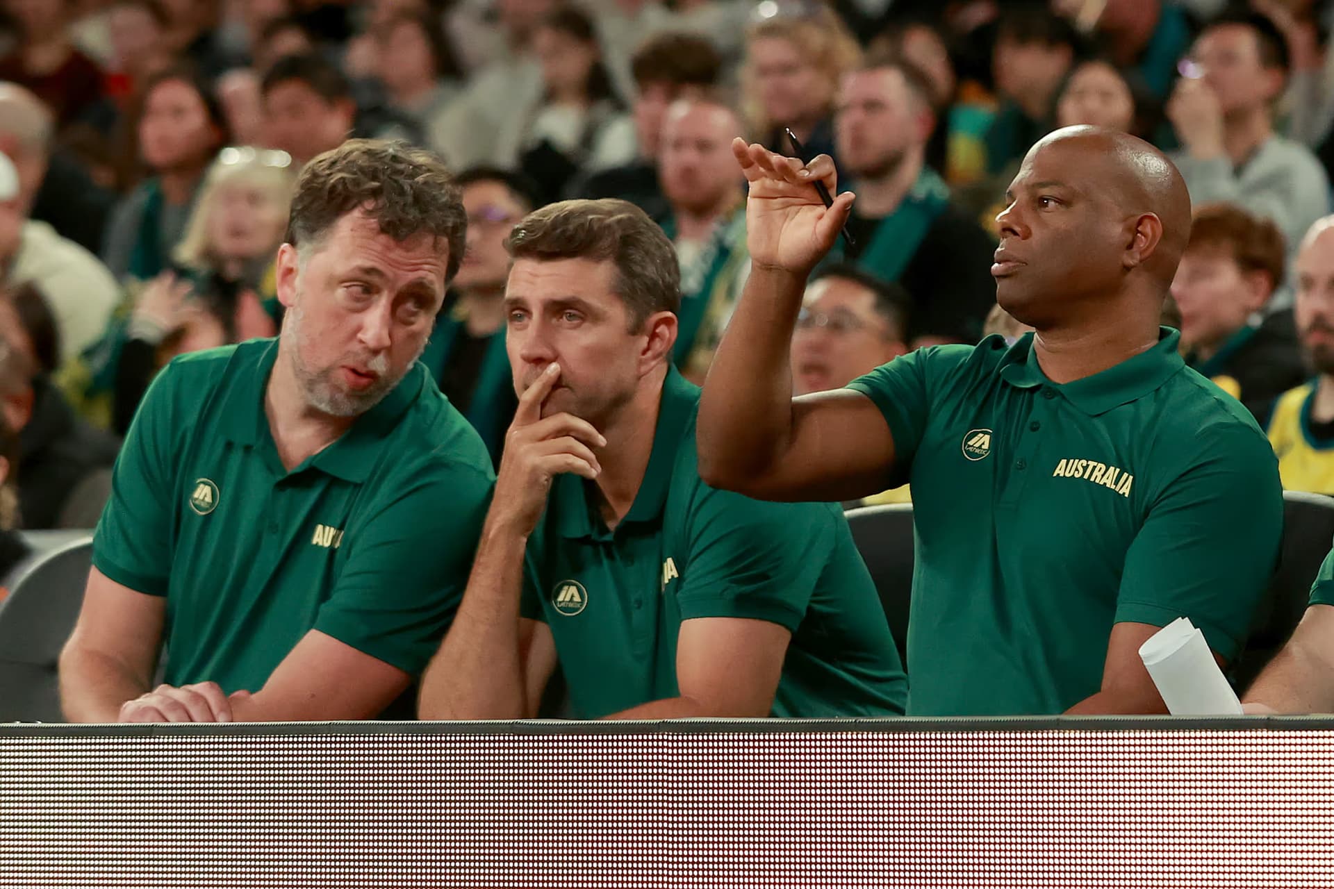 Matt Nielsen, Adam Caporn, and David Patrick, assistant coaches of the Boomers, look on during the game between the Australia Boomers and China at John Cain Arena on July 2, 2024 in Melbourne. Photo: Kelly Defina/Getty Images