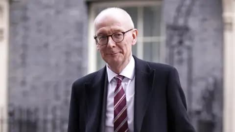 PA Media Work and Pensions Secretary Pat McFadden walks out of 10 Downing Street after attending a Cabinet meeting on 3 March.